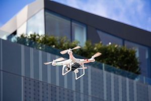 one of the primary uses for drones in 2018 which involves film production at highrise buildings
