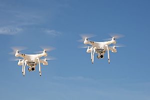 two drones of the same model flying next to each other which are both one of the top 5 drones on the market for the film and cinematography industry